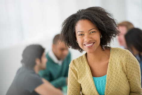 celta-smiling-teacher-with-students